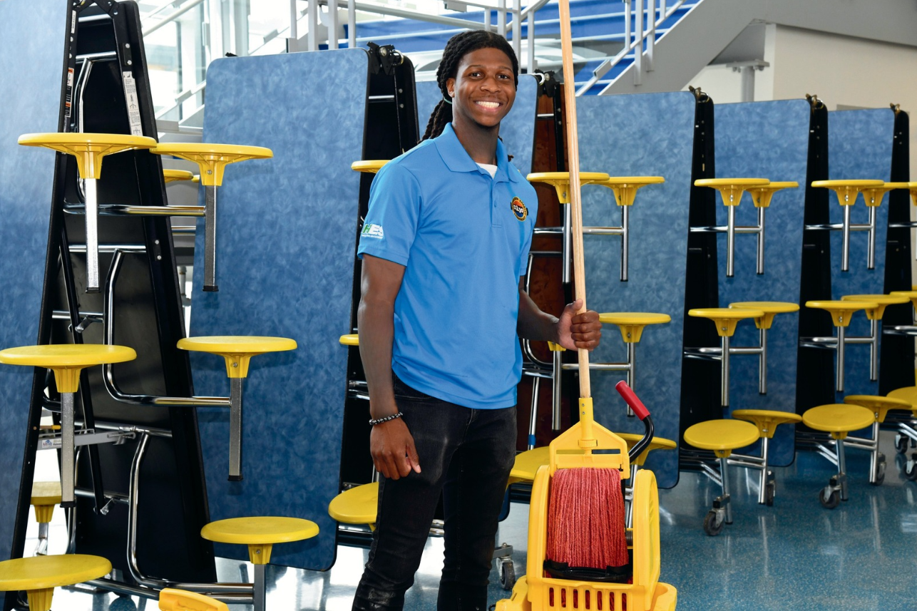 Custodian with mop-SANS tattoos-1